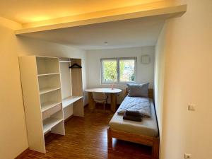 Postel nebo postele na pokoji v ubytování "Cooles Ferienhaus!" - im Coburger Wonderland - Ihr Zuhause auf Zeit!