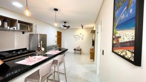 Η κουζίνα ή μικρή κουζίνα στο Residencial Bianca, Ap16 1 Andar +10 φωτογραφίες