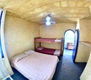 Ένα ή περισσότερα κρεβάτια σε δωμάτιο στο 7 Mares