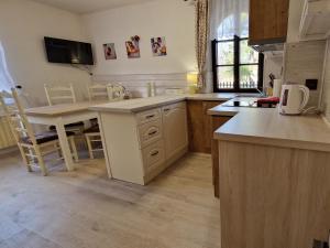 Kuchyň nebo kuchyňský kout v ubytování Apartmány Modus 2