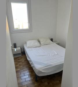 Posteľ alebo postele v izbe v ubytovaní Appart T2 - 200m plage - 4/6p Le Grau du Roi