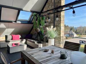 Balkón nebo terasa v ubytování Loft de prestige au pied du circuit