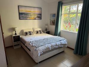 En eller flere senge i et værelse på Maison Lacoste, villa 150 m2, jardin 750m2