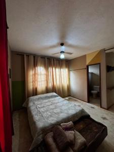 Postel nebo postele na pokoji v ubytování Casa com vista espetacular