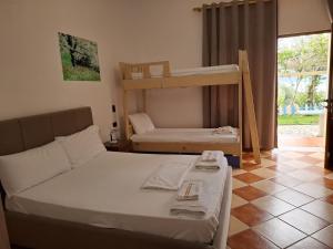 Hotel Sirena客房内的一张或多张床位