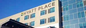 a large building with the name of a mart of palace at Hyatt Place Houston- Northwest/Cy-Fair in Houston