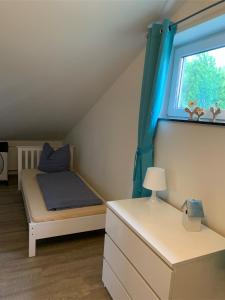 Postel nebo postele na pokoji v ubytování Müritz BELI
