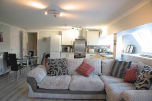 Una cocina o kitchenette en The Stables - Fabulous stylish flat in Merchant City & Free Secure Parking