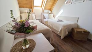 Postel nebo postele na pokoji v ubytování Apartmán NIKI Apollon Resort Lednice