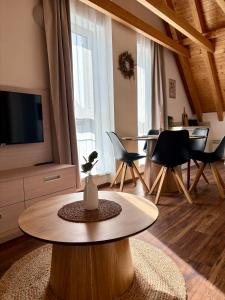 TV a/nebo společenská místnost v ubytování Apartmán NIKI Apollon Resort Lednice