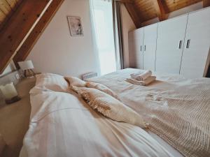 Postel nebo postele na pokoji v ubytování Apartmán NIKI Apollon Resort Lednice
