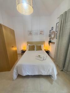 Postel nebo postele na pokoji v ubytování Casa a 50 metros de la playa. Supreme Pedro