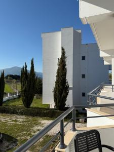 a view of a building from a balcony at Amare Apartaments in Orikum