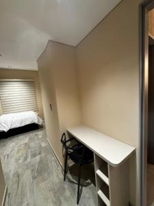 Rúm í herbergi á Increíble ApartaEstudio 1 Para Tu Estadía En Tunja