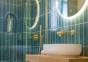 a bathroom with a sink and a mirror at LA VILLA AURELIA in Bacoli +64 photos