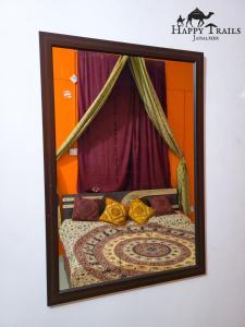 Una cama o camas en una habitación de Happy Trails Jaisalmer