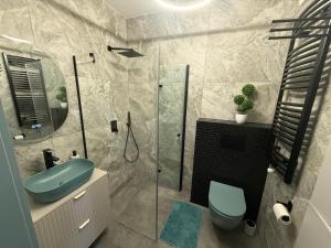 Ένα μπάνιο στο Luna Apartament Łagów Klima Smart Tv +19 φωτογραφίες