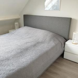 Postel nebo postele na pokoji v ubytování Greenfee vakantieappartement + 38 fotografií