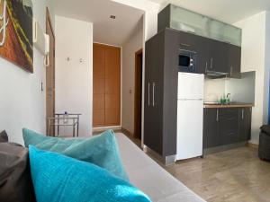 Kuchyňa alebo kuchynka v ubytovaní Suite Apartment City Center - Aloha Sevilla