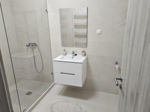 Koupelna v ubytování Berzsenyi Apartmanház