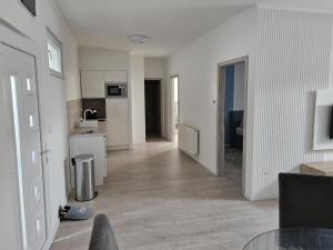 TV a/nebo společenská místnost v ubytování Berzsenyi Apartmanház