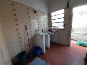 Kuchyň nebo kuchyňský kout v ubytování Hospedaje Quintana