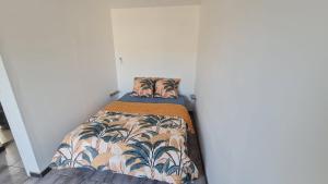 Ένα ή περισσότερα κρεβάτια σε δωμάτιο στο Maison Proche Mer