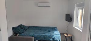 Μια τηλεόραση ή/και κέντρο ψυχαγωγίας στο Maison Proche Mer