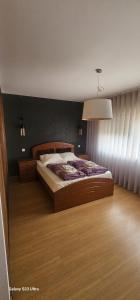 a bedroom with a bed in a room at Apartamento Familia Azevedo in Esposende