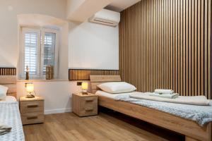 Posteľ alebo postele v izbe v ubytovaní Apartments Villa Sol