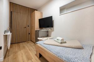 Posteľ alebo postele v izbe v ubytovaní Apartments Villa Sol
