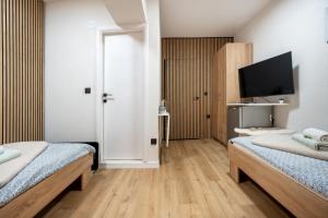 Posteľ alebo postele v izbe v ubytovaní Apartments Villa Sol