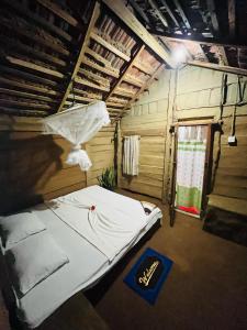 a room with a bed and a window in it at A9 home residence in Tangalle