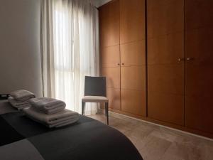Posteľ alebo postele v izbe v ubytovaní Suite Apartment City Center - Aloha Sevilla