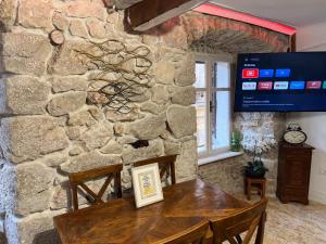 TV a/nebo společenská místnost v ubytování B&B Apartments Coli Apartman Dora Self check in