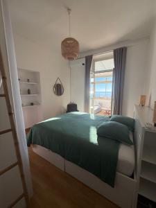 Posteľ alebo postele v izbe v ubytovaní Frontiere de Monaco 3 Pieces Vue Mer