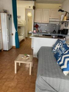 Kuchyňa alebo kuchynka v ubytovaní Port Cros Appartement