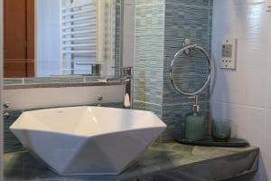 Koupelna v ubytování Sofotel