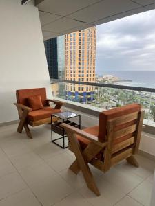 Posezení v ubytování برج داماك الجوهرة Damac Al Jawhara Tower