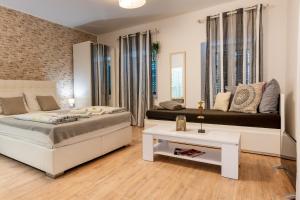 Posteľ alebo postele v izbe v ubytovaní Apartments Villa Sol