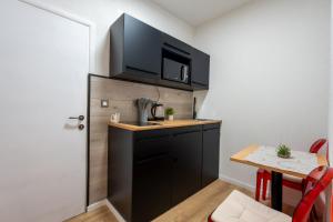 Kuchyňa alebo kuchynka v ubytovaní Apartments Villa Sol