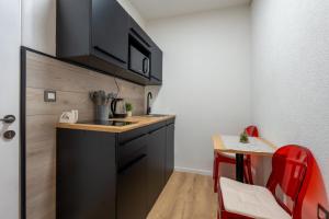 Kuchyňa alebo kuchynka v ubytovaní Apartments Villa Sol