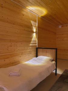 Postel nebo postele na pokoji v ubytování Bai Hotel