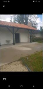a large building with a roof on top of it at Samsam in Mignaloux-Beauvoir