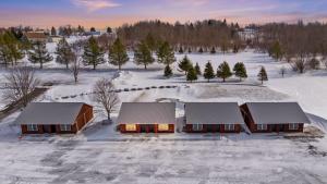 an aerial view of a house in the snow at The View Boutique Hotel Suites in Tully +82 photos