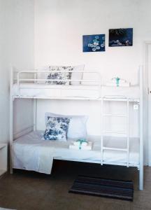 Ένα ή περισσότερα κρεβάτια σε δωμάτιο στο Casa delle ninfee vicino al lungomare +10 φωτογραφίες