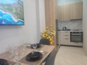 Kuchyň nebo kuchyňský kout v ubytování BP Beach Apartments