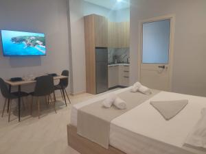 Postel nebo postele na pokoji v ubytování BP Beach Apartments