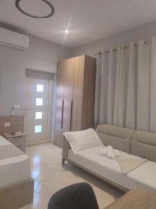 Postel nebo postele na pokoji v ubytování BP Beach Apartments