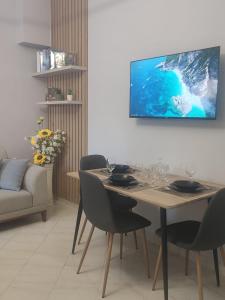 TV a/nebo společenská místnost v ubytování BP Beach Apartments